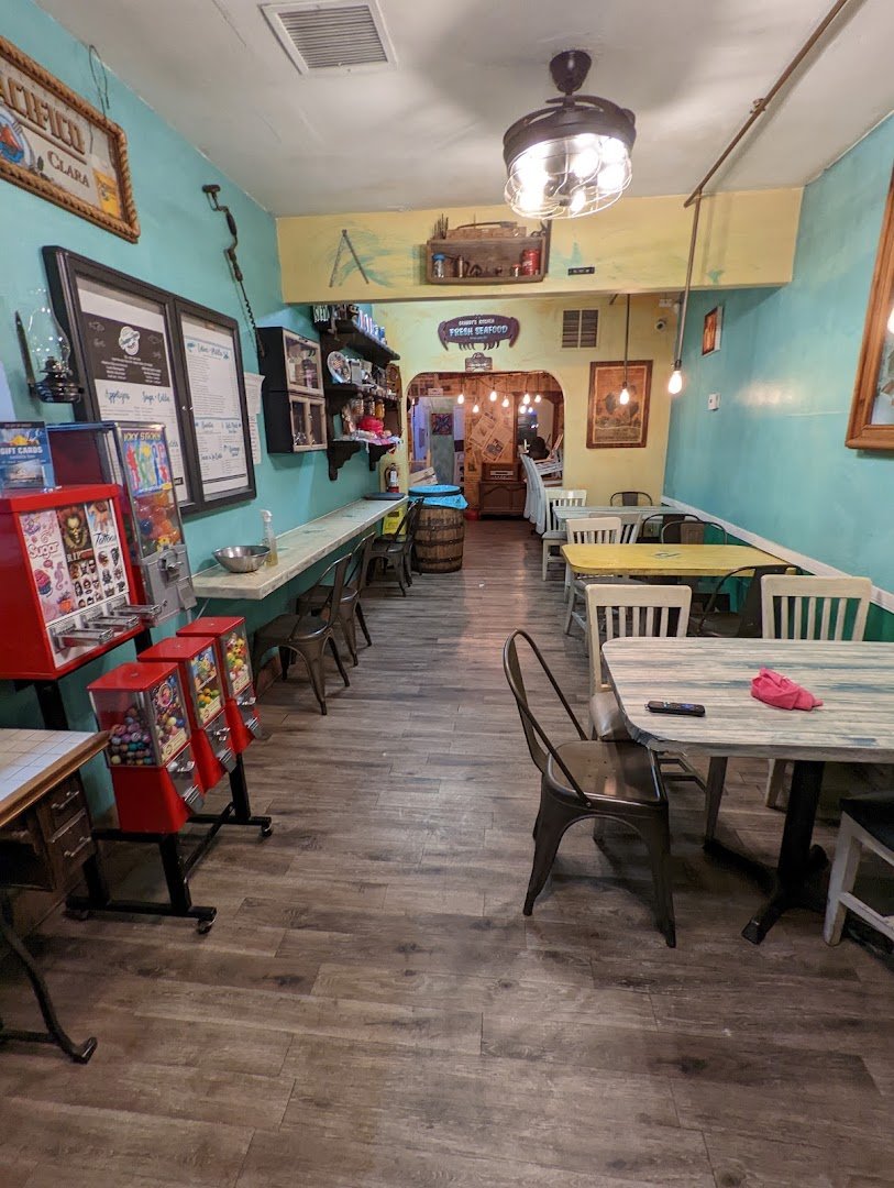 Seafood dishes on a casual restaurant table.
